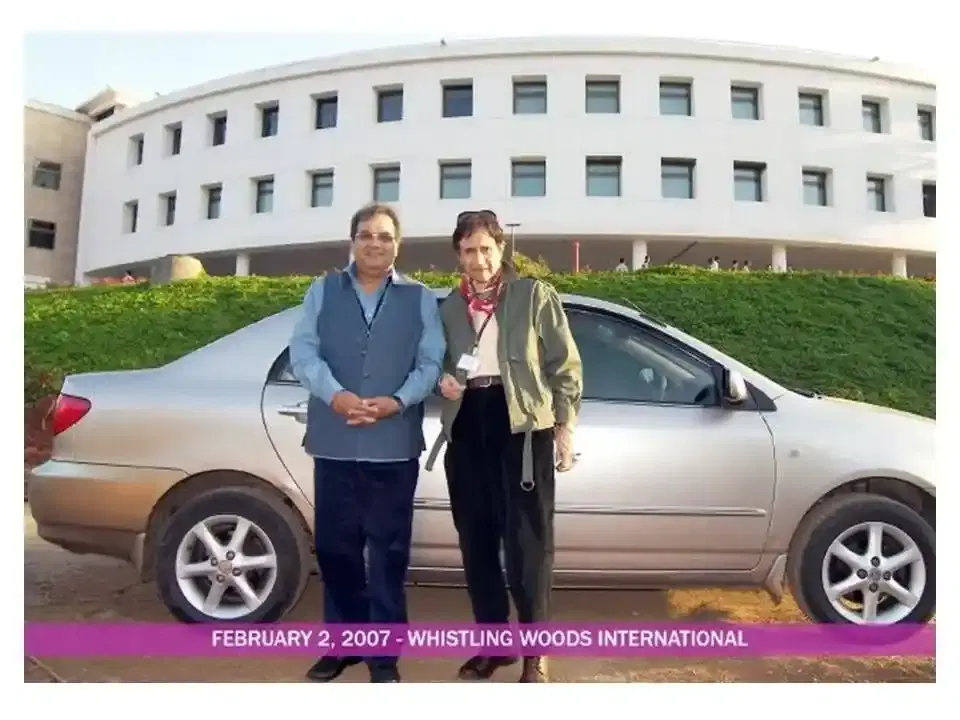 Two men outside the Whistling Woods International campus on 2 February 2007