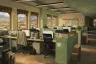 SGM Studios animation background: an open-plan office with mountain views